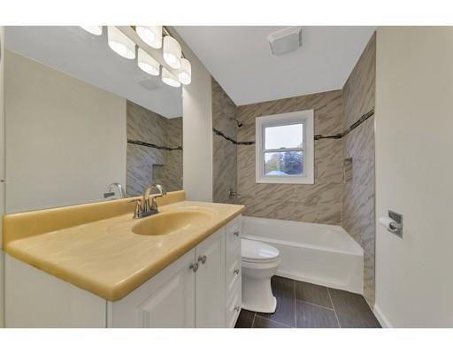 106 Fallston Street Springfield, MA 01119 - Photo 4 of 14 a bathroom with a sink toilet and shower