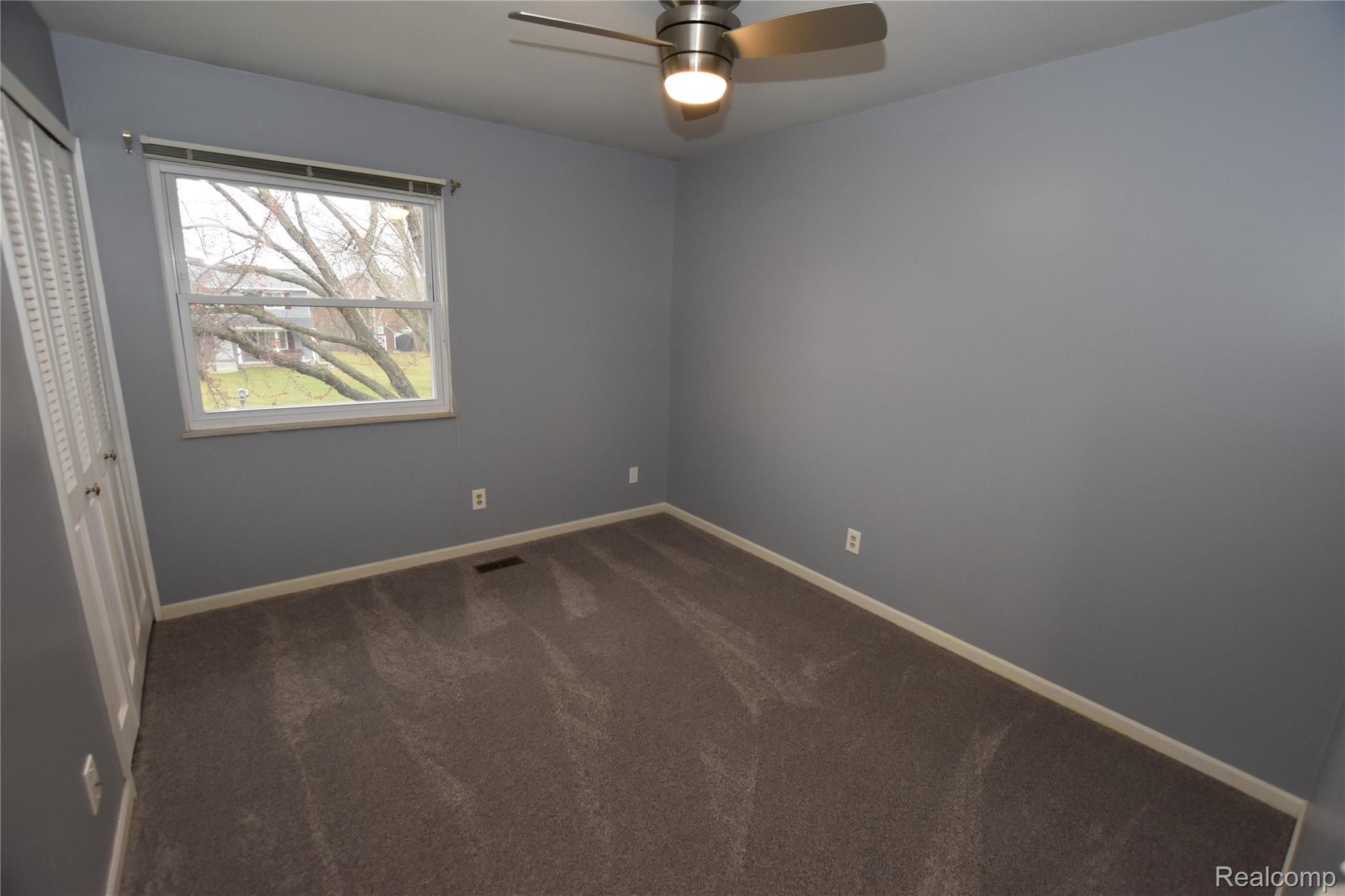 1231 Stonehenge Road Flint, MI 48532 - Photo 14 of 20 Bedroom 3 with deep closet