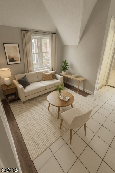 649 Mt Prospect Avenue Newark, NJ 07104 - Photo 6 of 8 a living room with furniture and a table