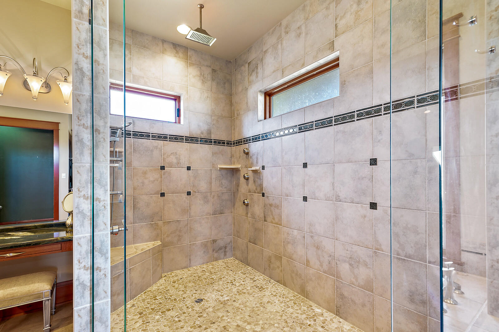 5405-5413 Seven Oaks Road Central Point, OR 97502 - Photo 43 of 65 a bathroom with a shower and a sink