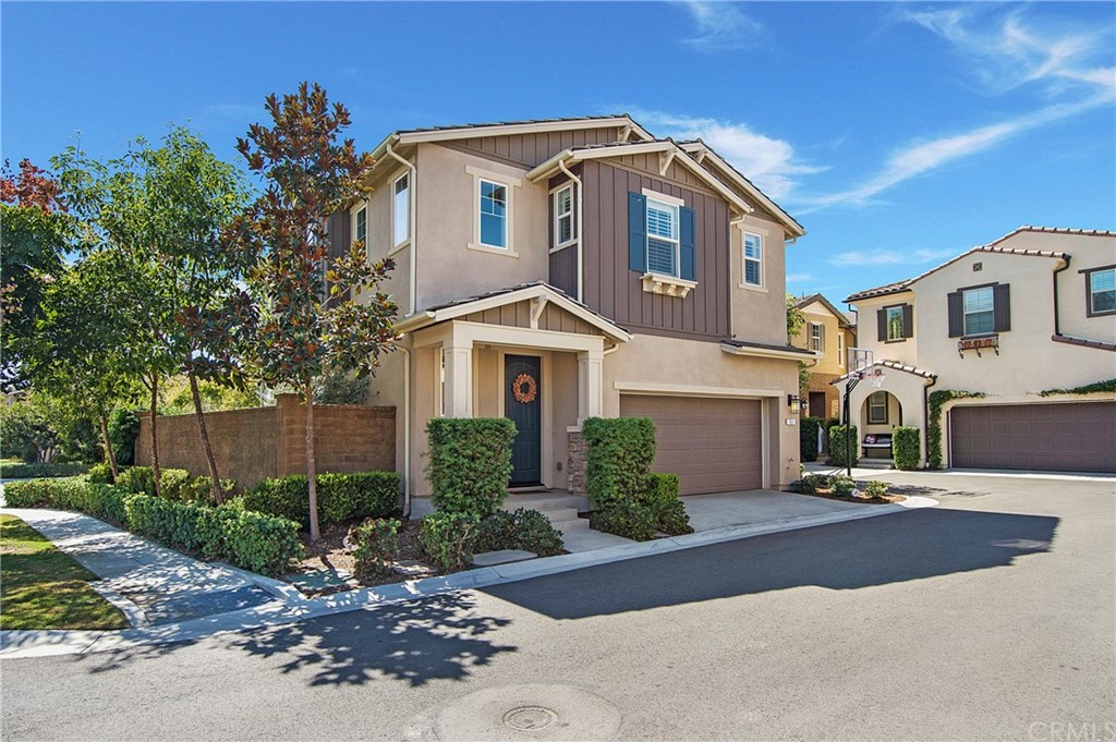 51 Baculo Street Rancho Mission Viejo, CA 92694 - Photo 1 of 1 a front view of a house with a yard