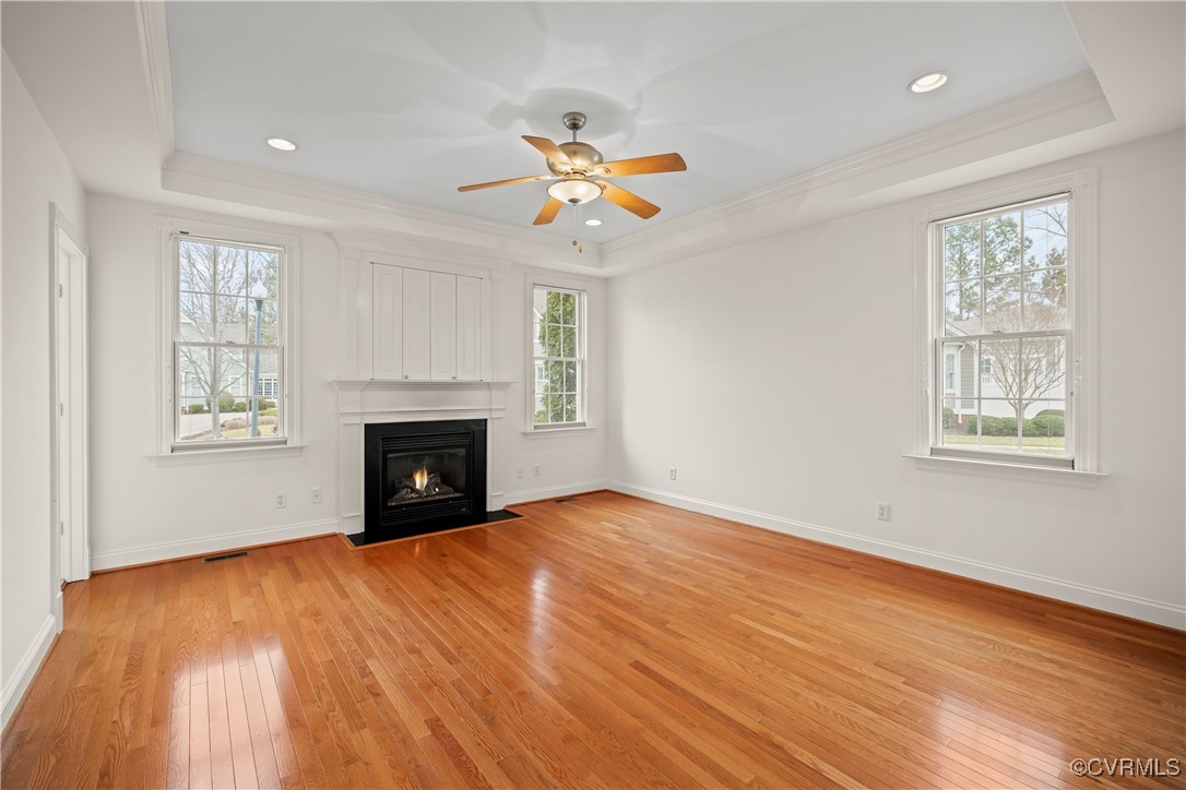 9037 Amberhill Loop Chesterfield, VA 23236 - Photo 25 of 47 a view of empty room with a fireplace and wooden floor