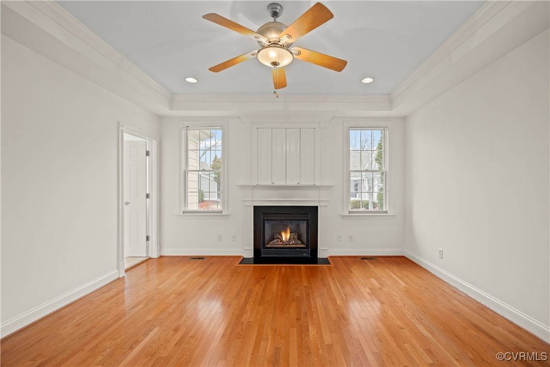 9037 Amberhill Loop Chesterfield, VA 23236 - Photo 26 of 47 an empty room with a fireplace and fan