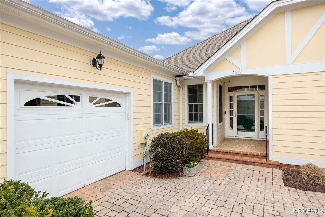 9037 Amberhill Loop Chesterfield, VA 23236 - Photo 3 of 47 a front view of a house with a yard