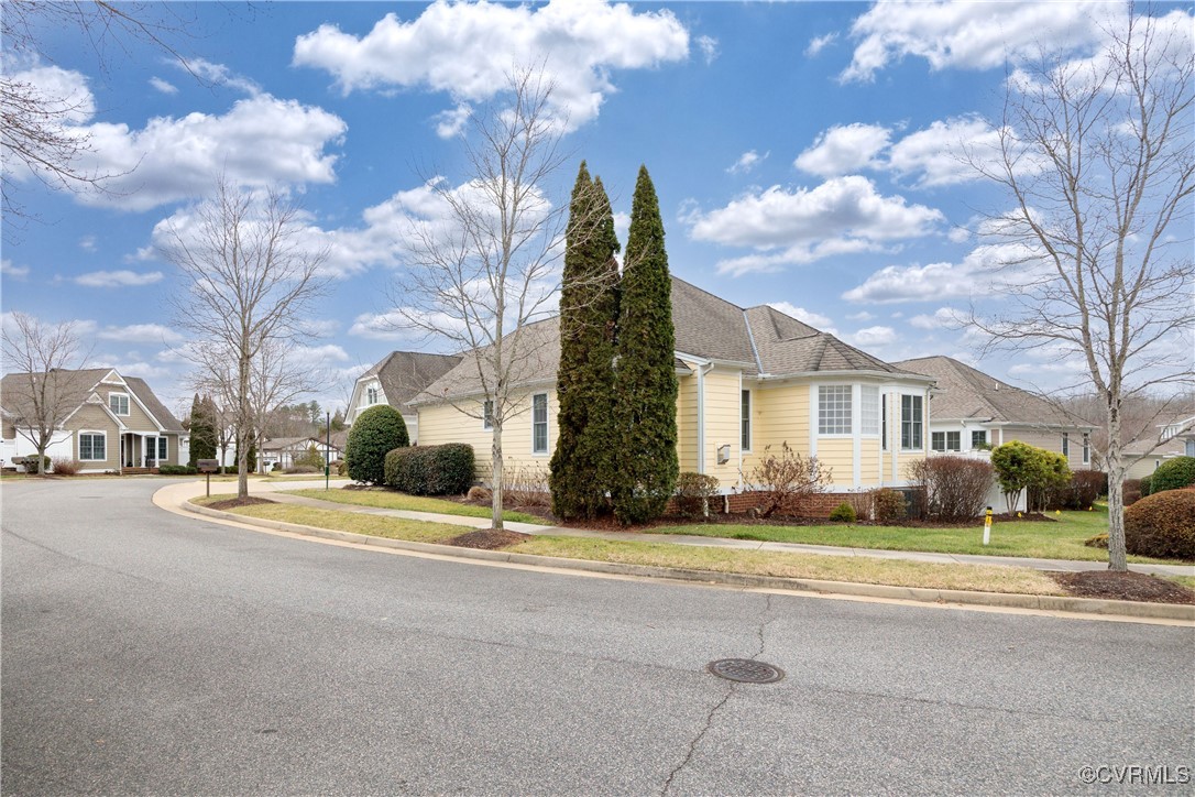 9037 Amberhill Loop Chesterfield, VA 23236 - Photo 5 of 47 a view of a city with houses on both side