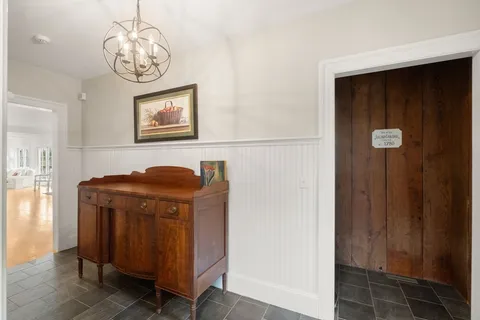 a view of a hallway with entryway