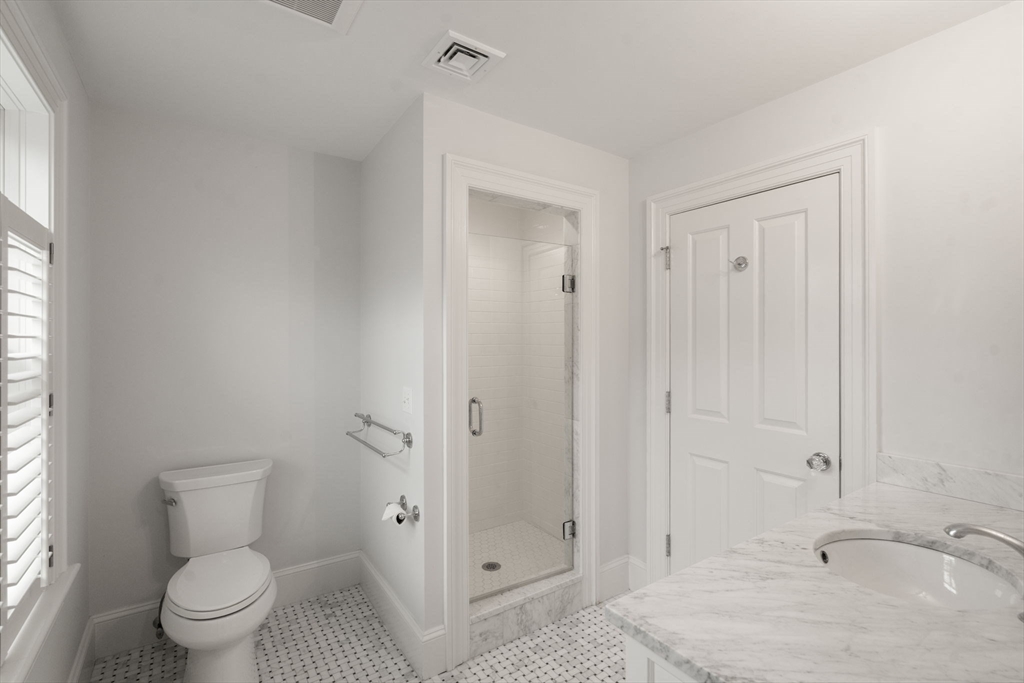 2 Snow Street Sherborn, MA 01770 - Photo 29 of 42 a bathroom with a sink toilet and shower