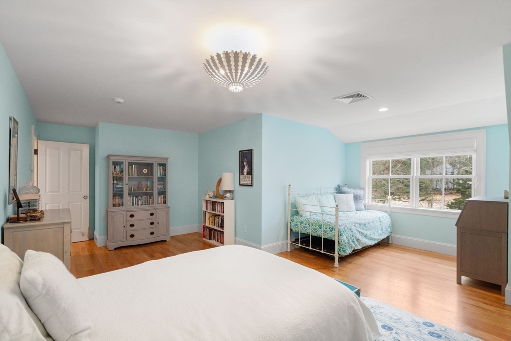2 Snow Street Sherborn, MA 01770 - Photo 31 of 42 a bedroom with furniture and a flat screen tv