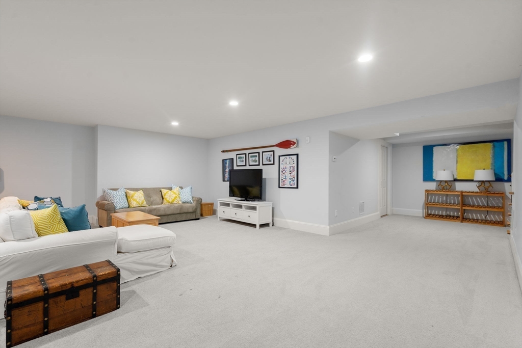 2 Snow Street Sherborn, MA 01770 - Photo 34 of 42 a living room with furniture and a flat screen tv