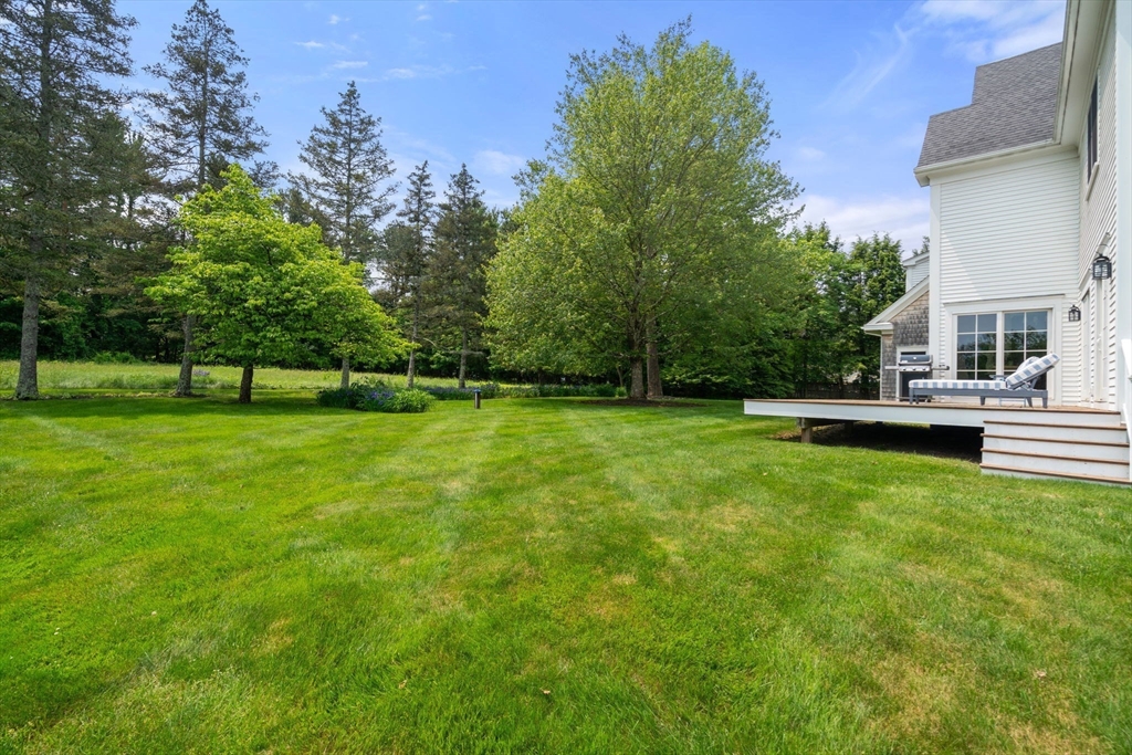 2 Snow Street Sherborn, MA 01770 - Photo 36 of 42 a view of a house with a big yard