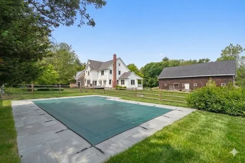 a view of a house with a big yard