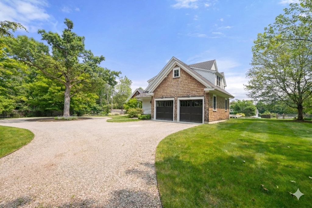 2 Snow Street Sherborn, MA 01770 - Photo 4 of 42 a front view of a house with a yard