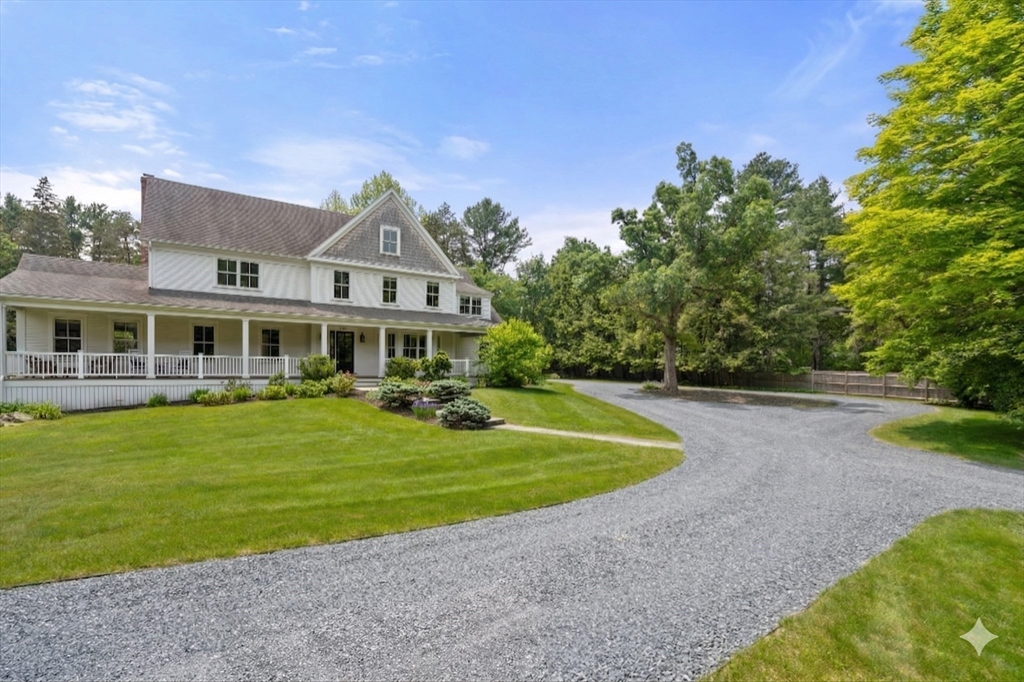 2 Snow Street Sherborn, MA 01770 - Photo 42 of 42 a front view of a house with garden