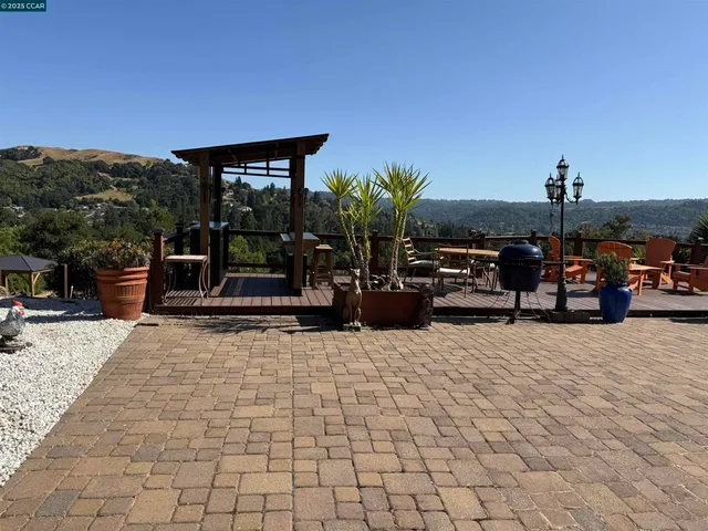 a view of a terrace with chairs
