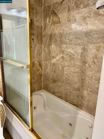 a bathroom with a bathtub
