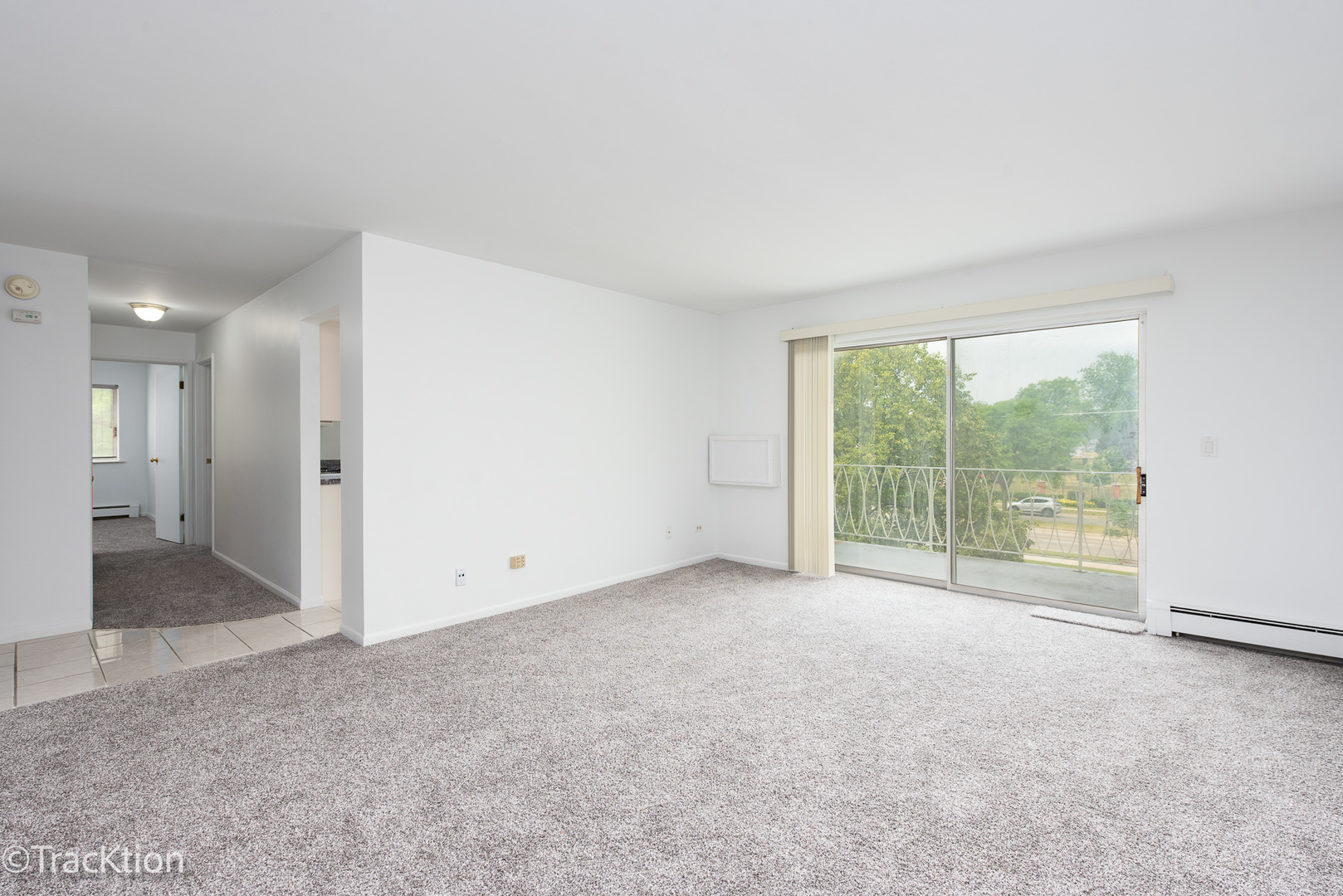 1301 South Finley Road, Unit 311 Lombard, IL 60148 - Photo 3 of 10 a view of an empty room with a large window