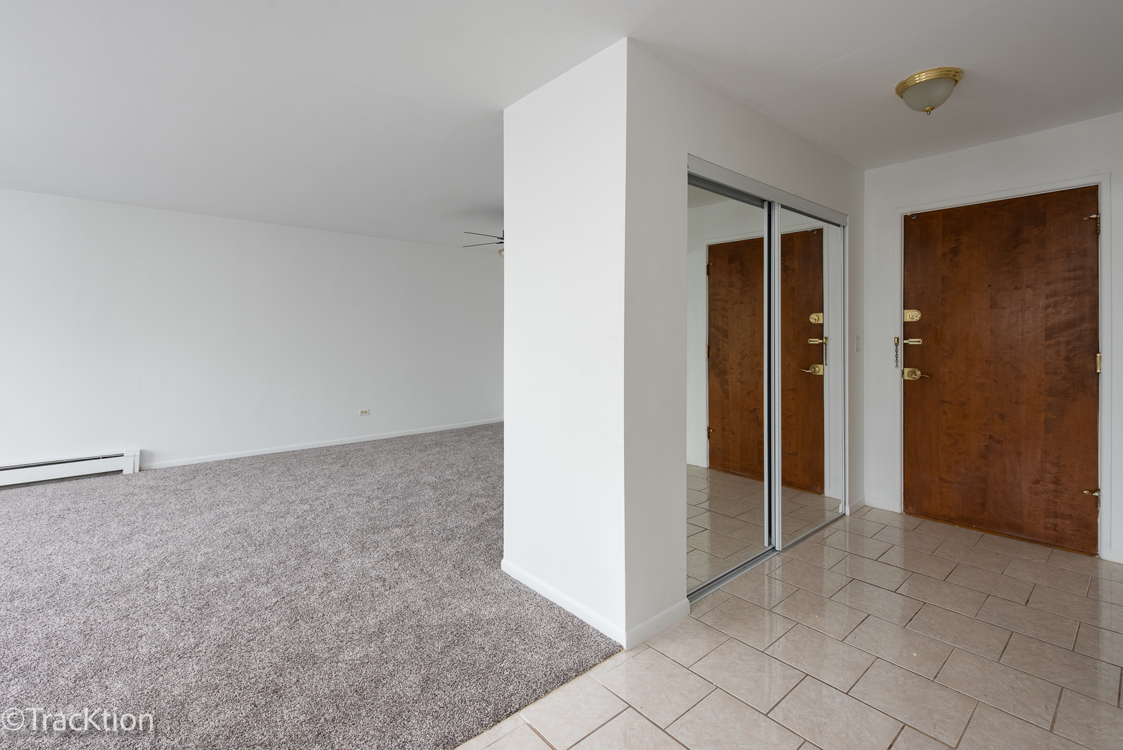 1301 South Finley Road, Unit 311 Lombard, IL 60148 - Photo 5 of 10 an empty room with closet