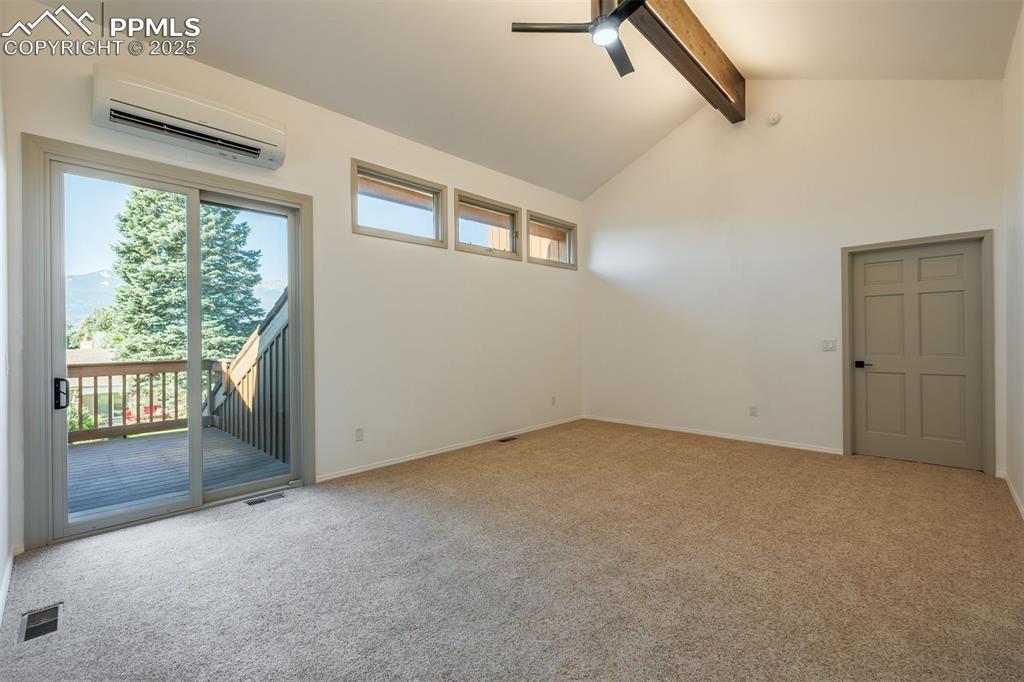 3870 Camels Ridge Lane Colorado Springs, CO 80904 - Photo 18 of 27 an empty room with windows