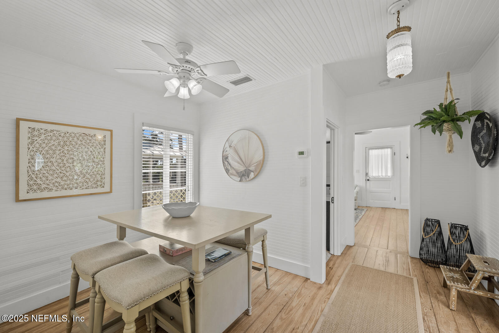 179 Blanco Street St. Augustine, FL 32084 - Photo 11 of 56 a view of a dining room with furniture window and wooden floor