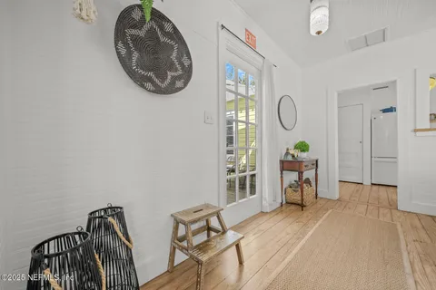 a view of living room with furniture and flat screen tv