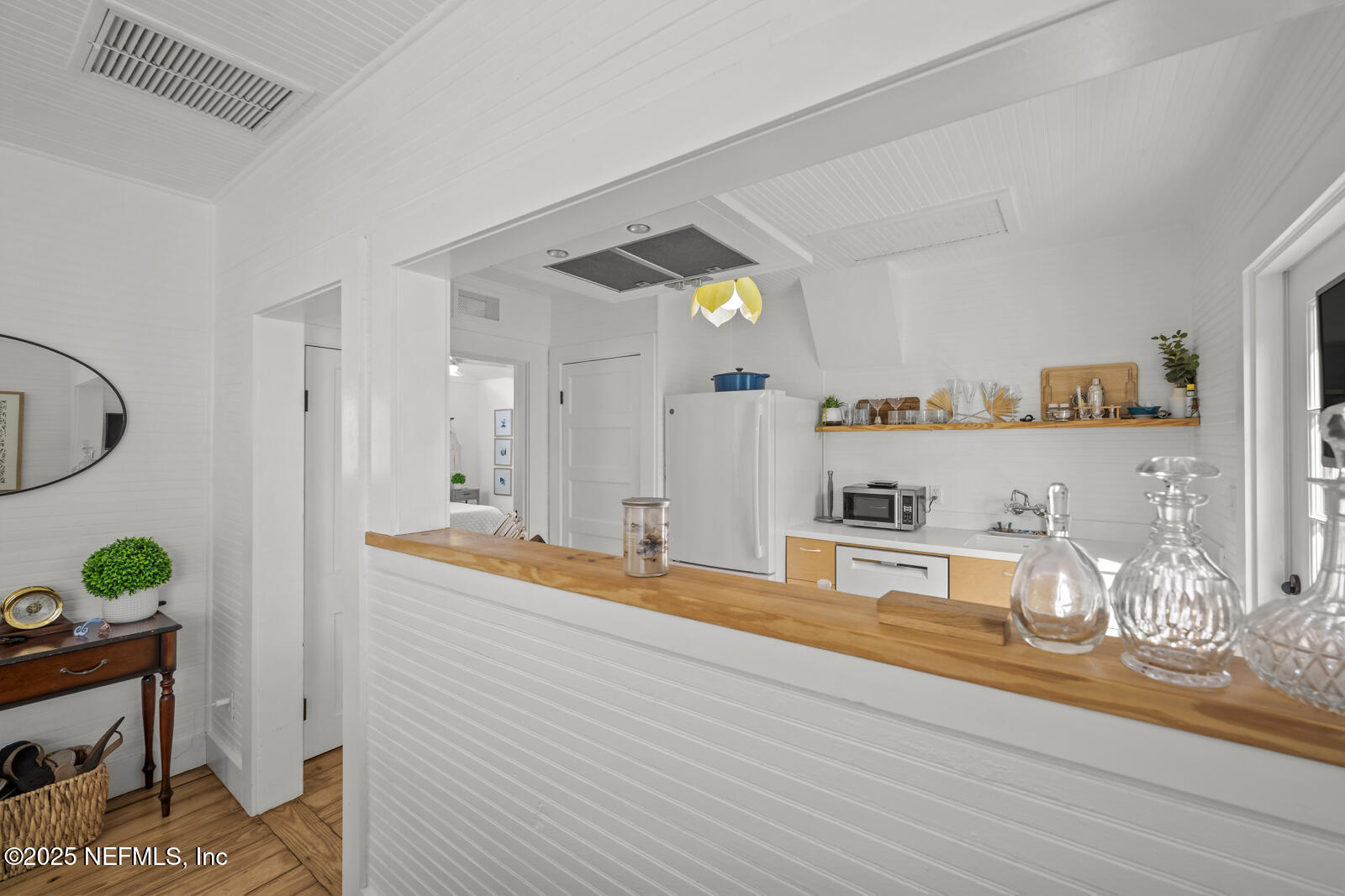 179 Blanco Street St. Augustine, FL 32084 - Photo 15 of 56 a room with kitchen island and stainless steel appliances