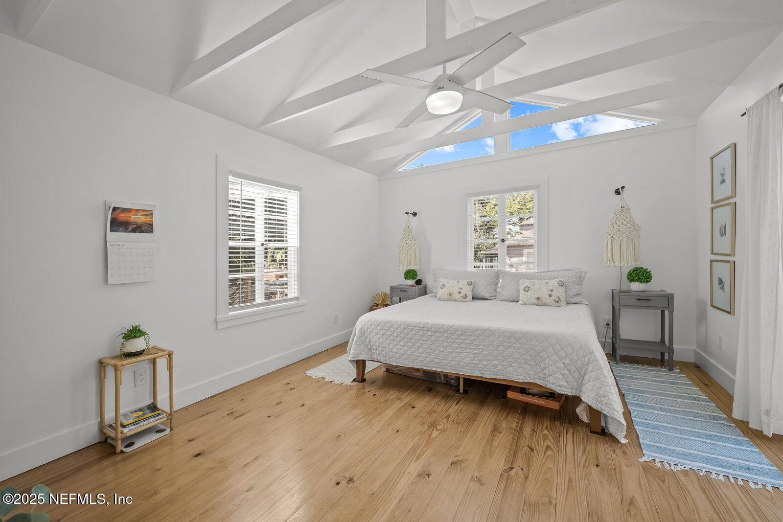 179 Blanco Street St. Augustine, FL 32084 - Photo 21 of 56 a spacious bedroom with a bed and a window