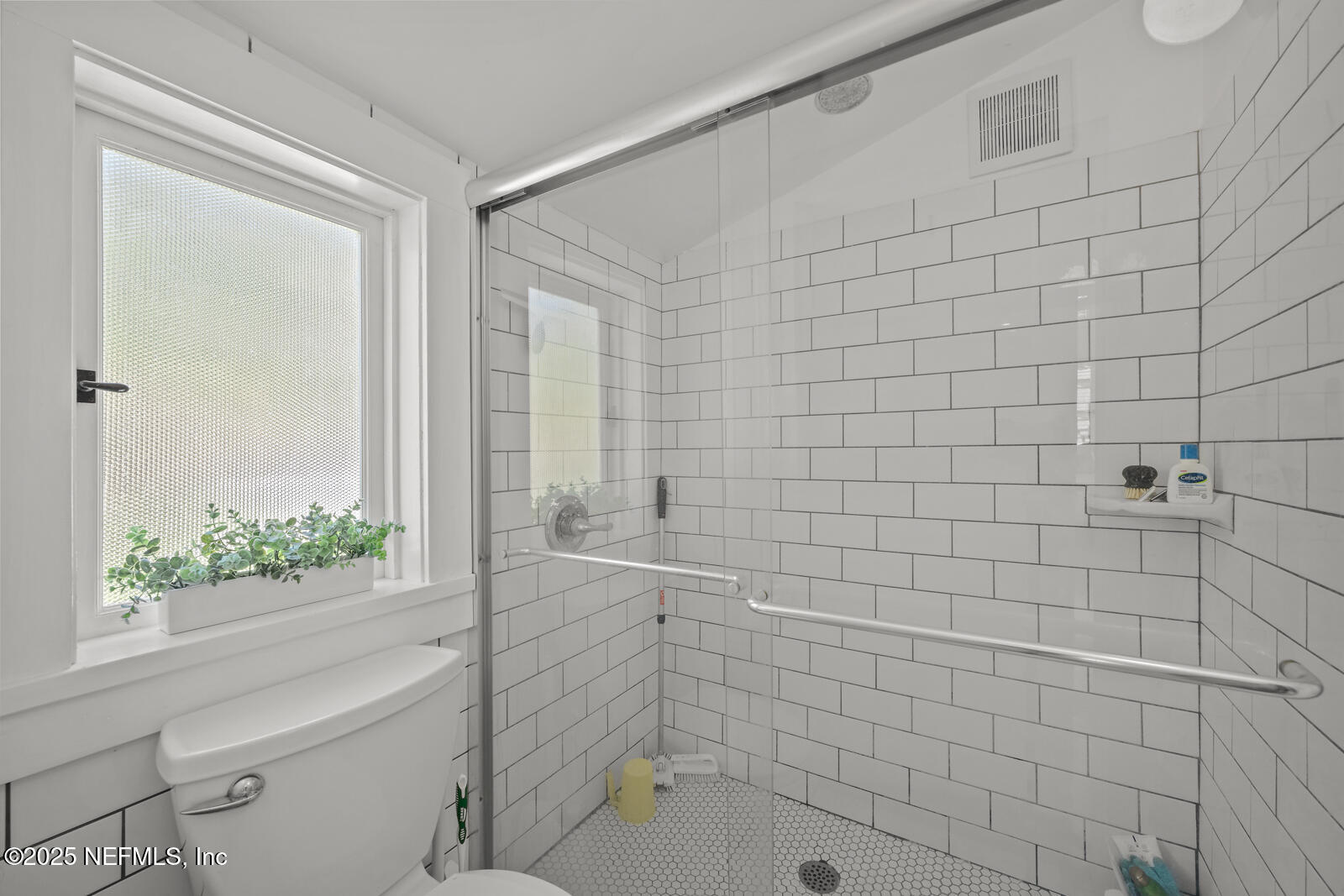 179 Blanco Street St. Augustine, FL 32084 - Photo 24 of 56 a bathroom with a shower