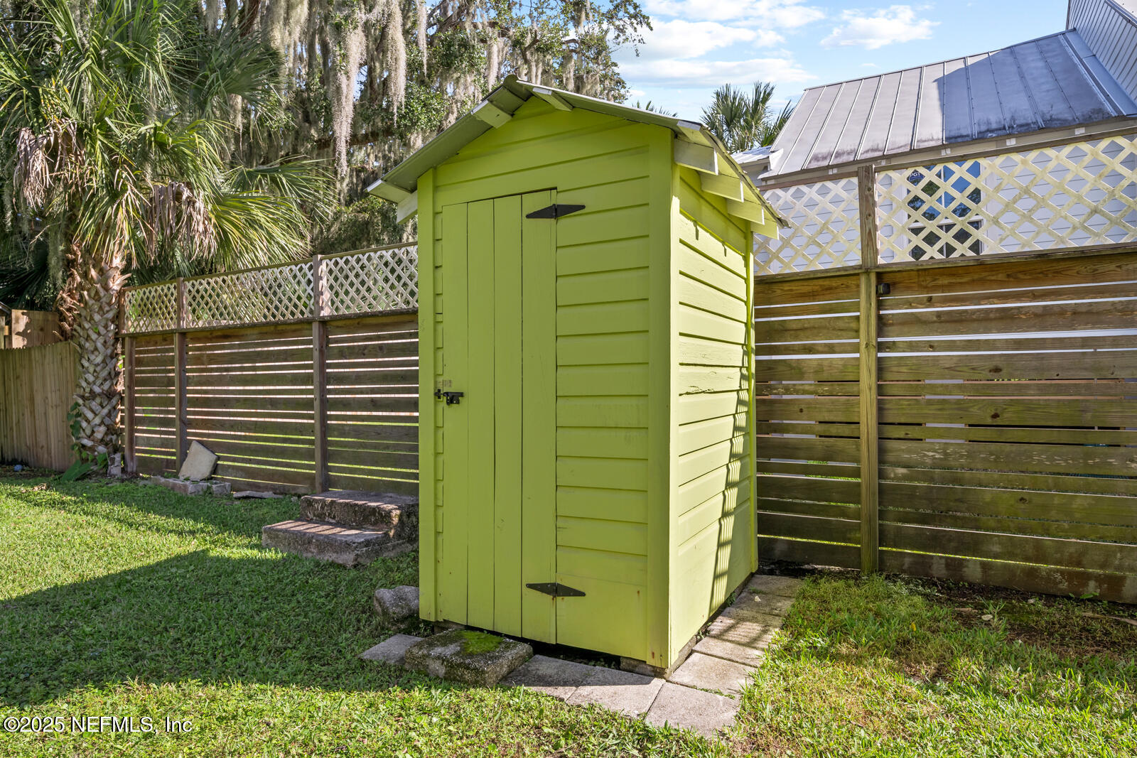 179 Blanco Street St. Augustine, FL 32084 - Photo 38 of 56 a view of a house with a backyard