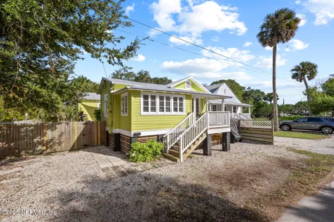 a view of a city with mountains in the background