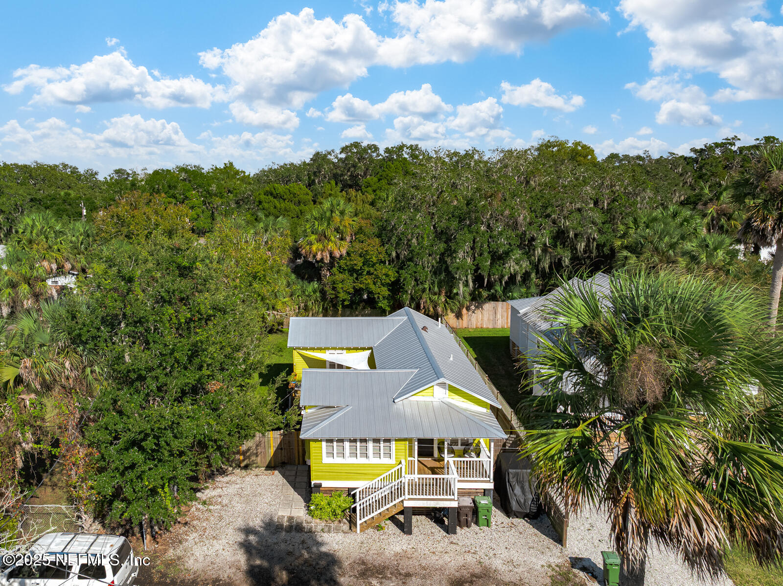 179 Blanco Street St. Augustine, FL 32084 - Photo 45 of 56 an aerial view of a house with swimming pool and mountain view
