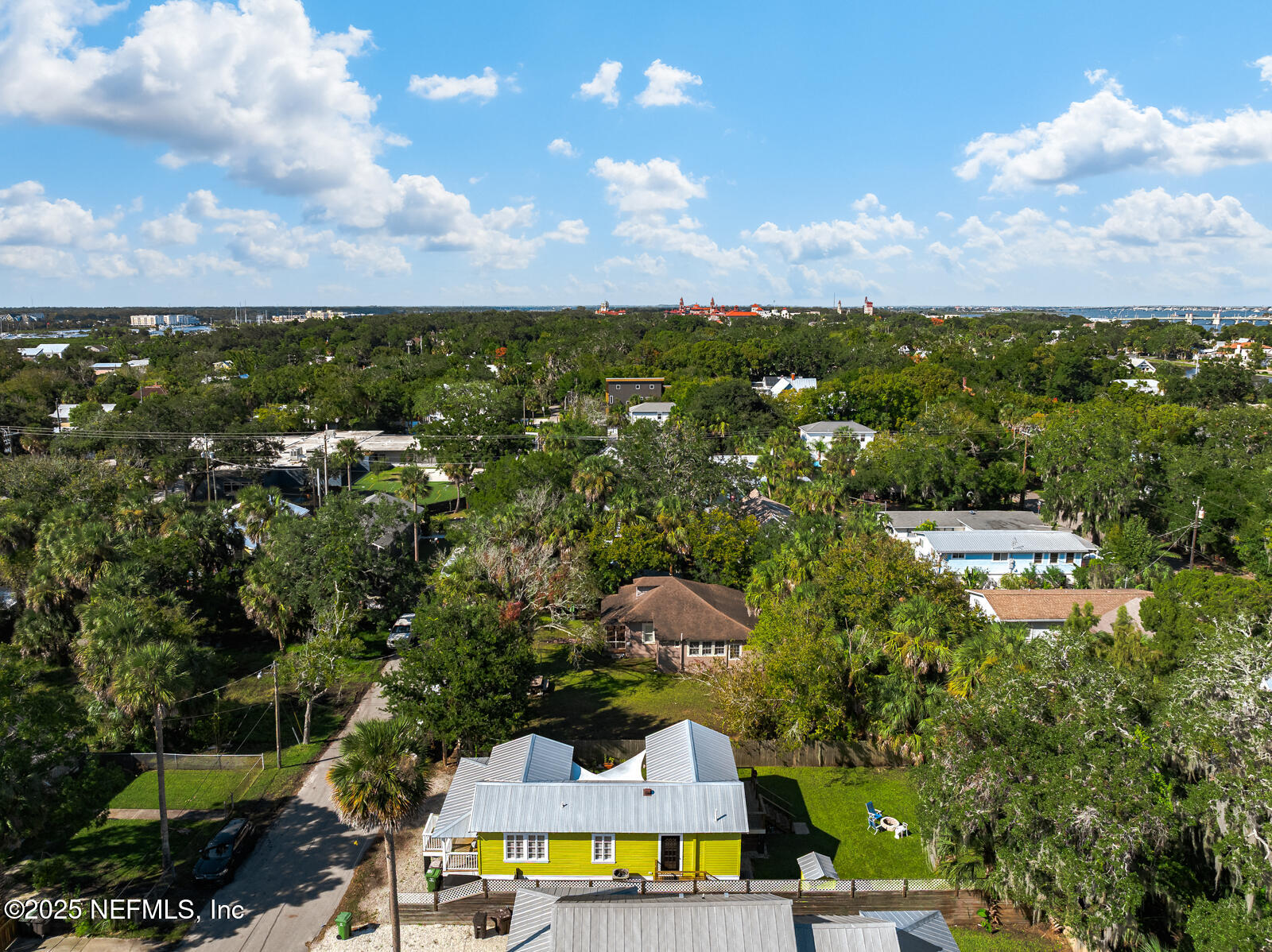 179 Blanco Street St. Augustine, FL 32084 - Photo 46 of 56 a view of a lake with a houses in the back