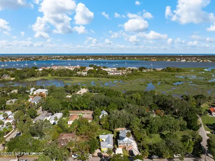 an aerial view of a house with a garden
