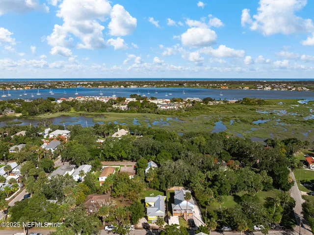an aerial view of a house with a garden