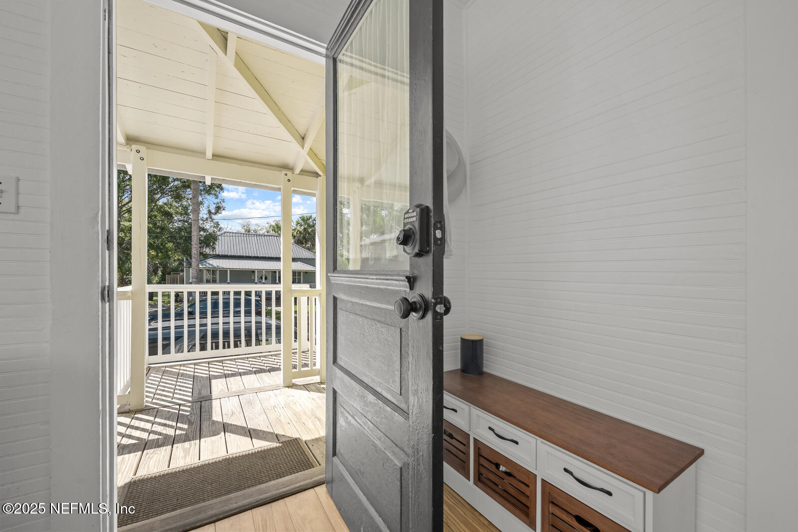 179 Blanco Street St. Augustine, FL 32084 - Photo 6 of 56 a view of a balcony and wooden floor