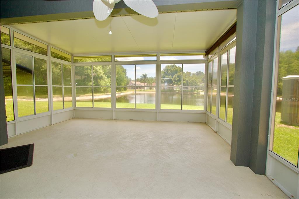 7842 Tenby Court New Port Richey, FL 34655 - Photo 16 of 27 a view of an empty room with window