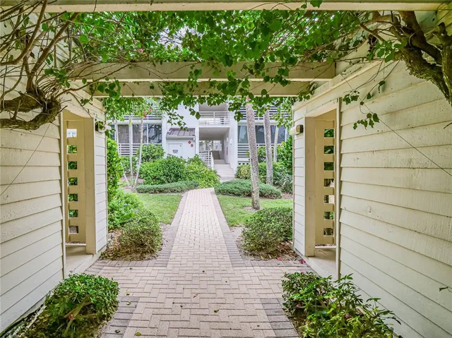 a view of a pathway with a yard