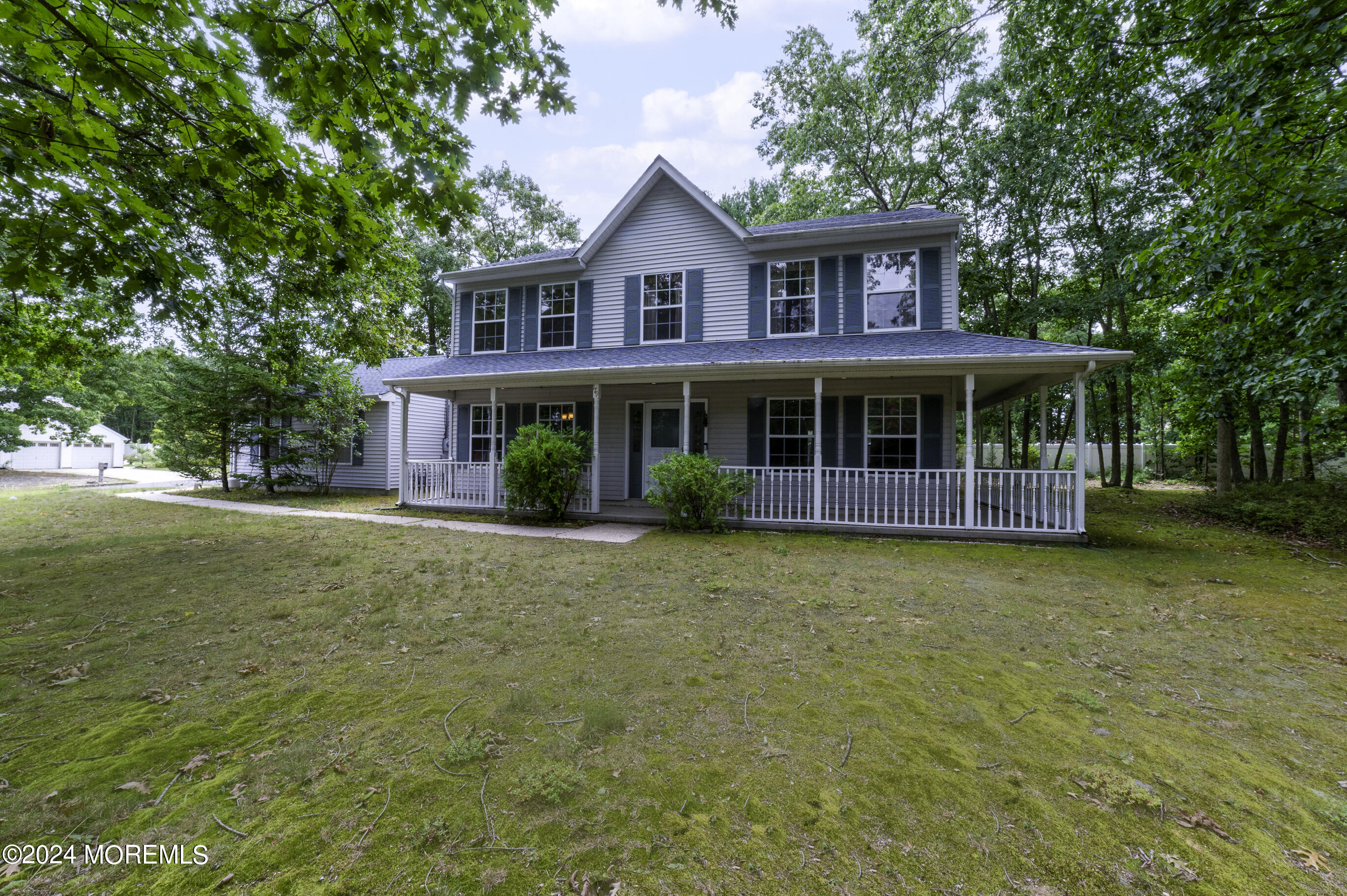 179 Wells Mill Road Waretown, NJ 08758 - Photo 1 of 28 a view of a house with a swimming pool