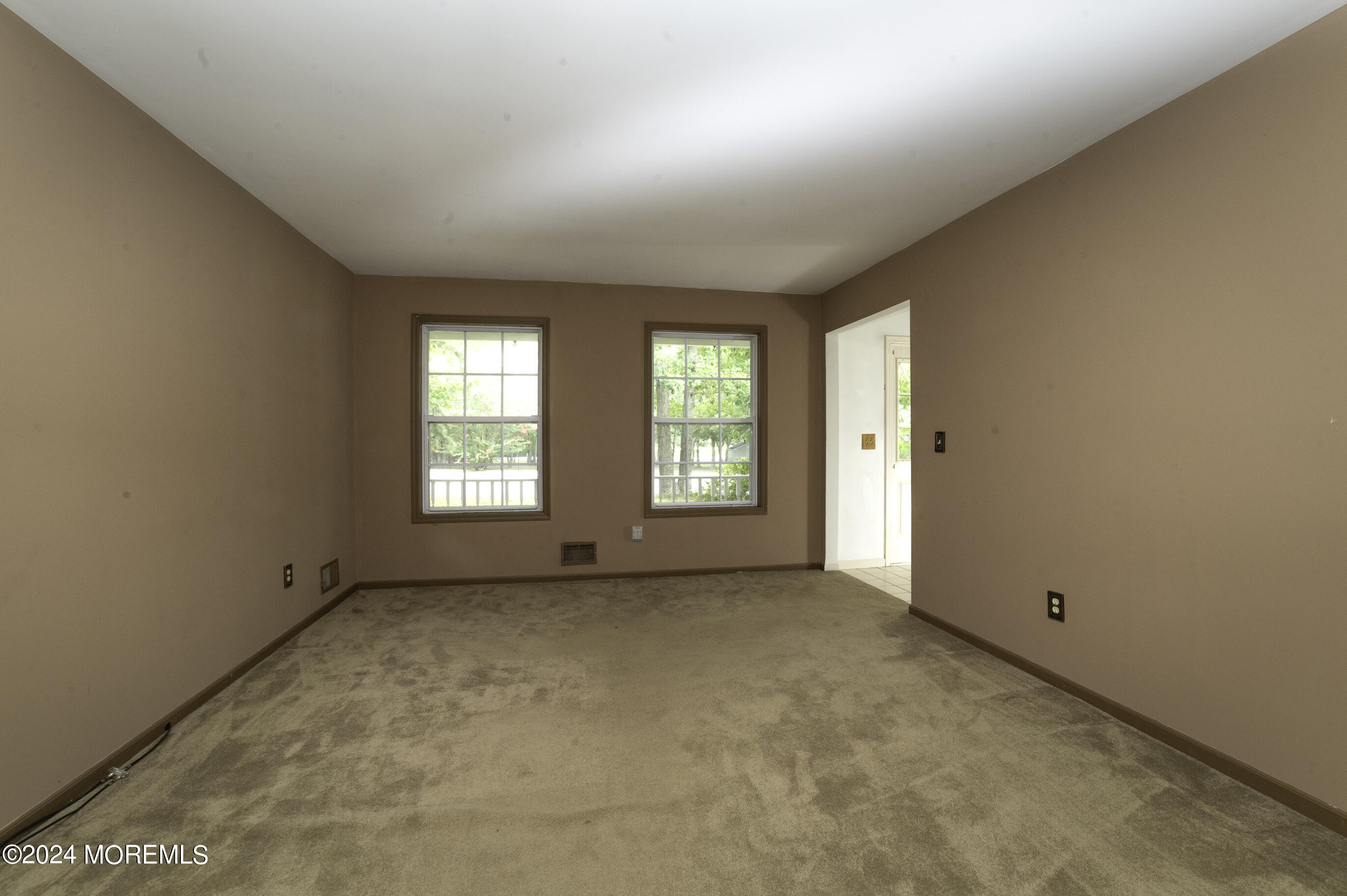 179 Wells Mill Road Waretown, NJ 08758 - Photo 13 of 28 an empty room with windows