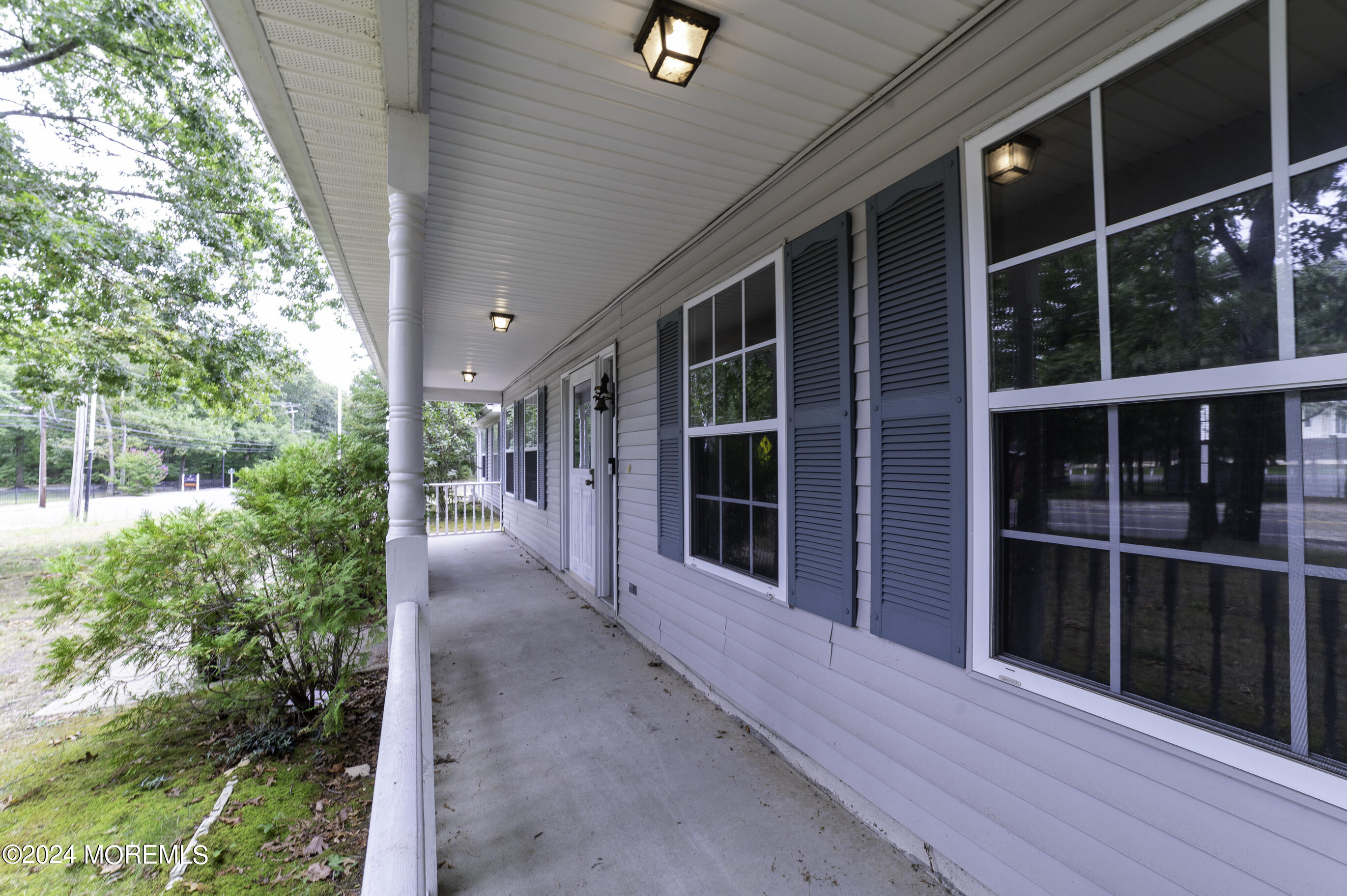 179 Wells Mill Road Waretown, NJ 08758 - Photo 2 of 28 a view of a house with a large window