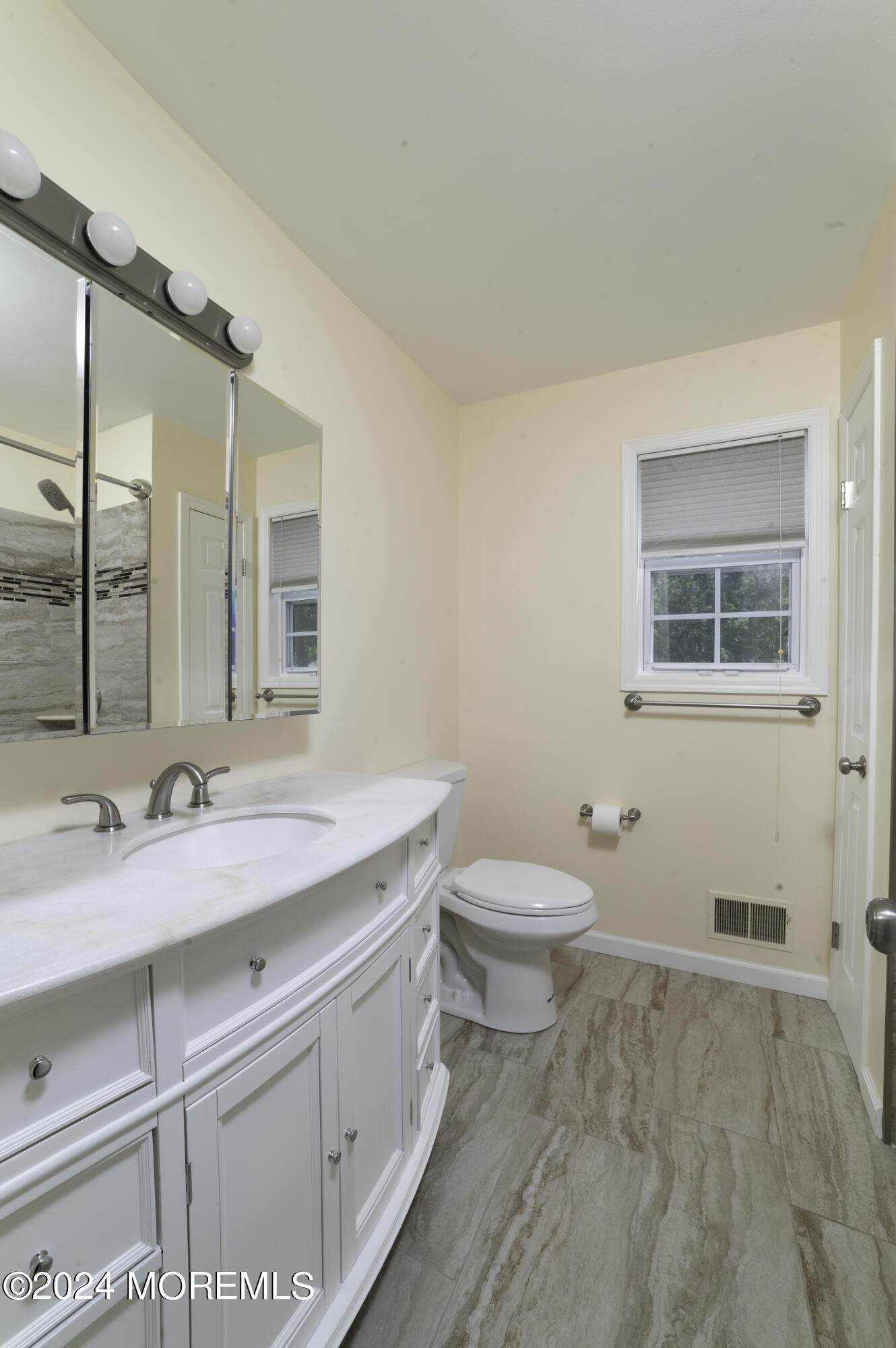 179 Wells Mill Road Waretown, NJ 08758 - Photo 23 of 28 a bathroom with a granite countertop sink mirror vanity and toilet