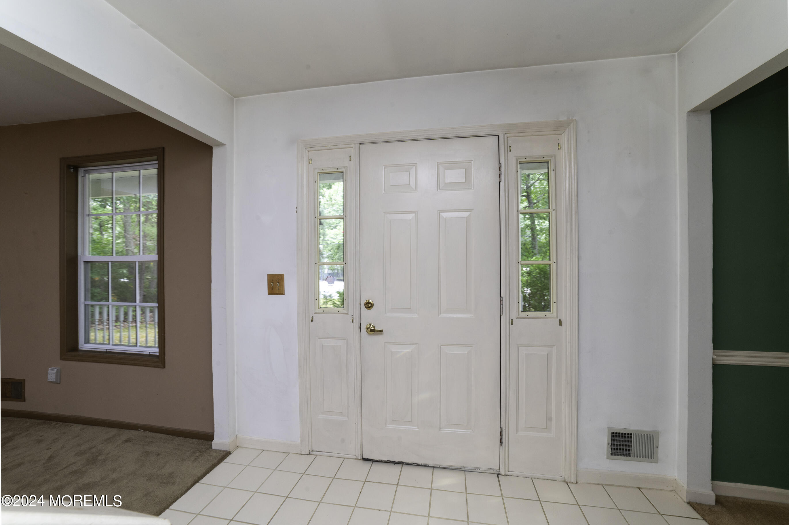 179 Wells Mill Road Waretown, NJ 08758 - Photo 3 of 28 a view of an entryway with wooden floor