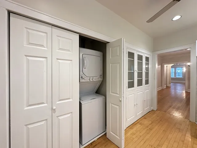 a view of a storage & utility room with washer and dryer