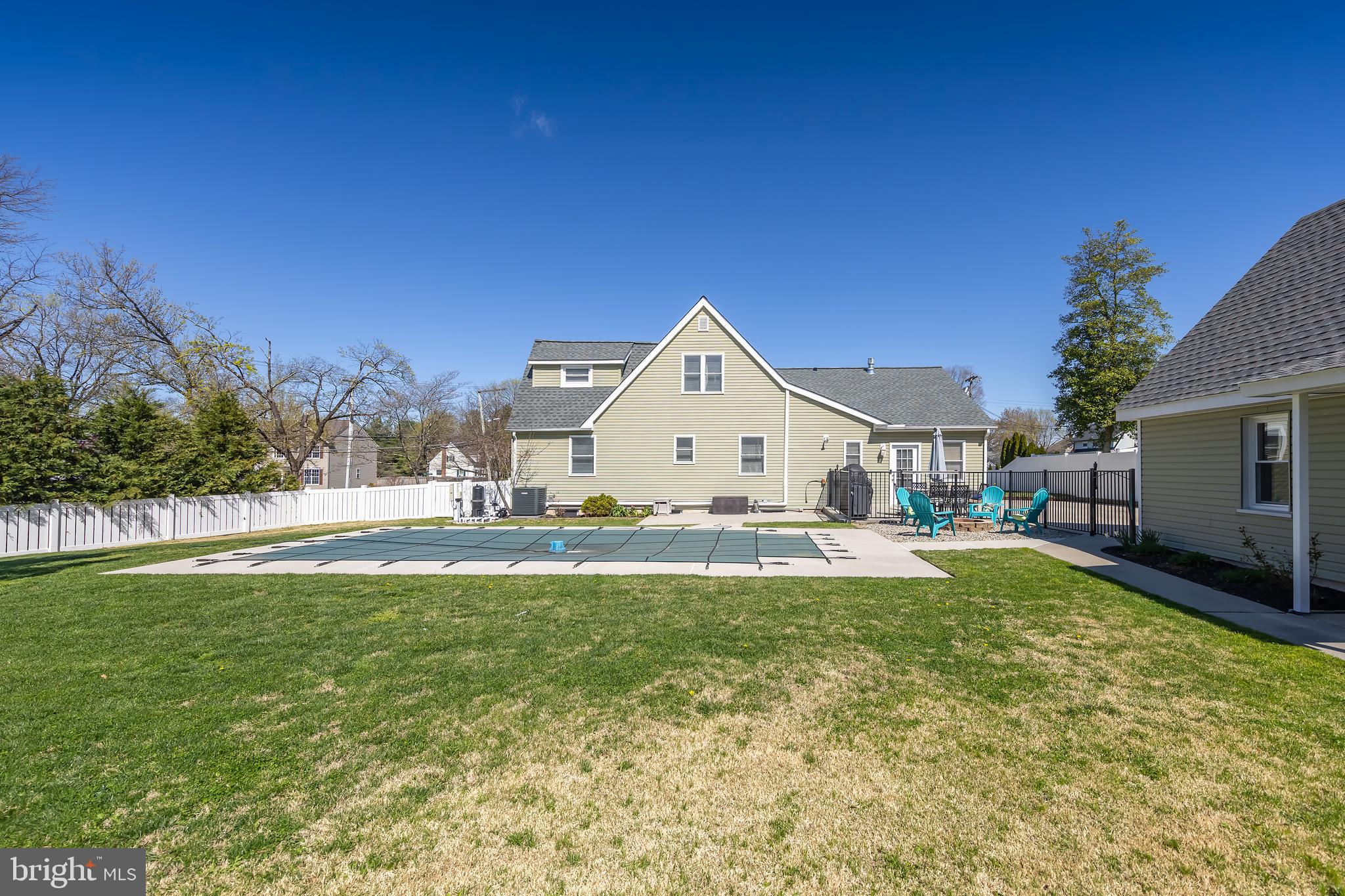 303 Main Street Mantua, NJ 08051 - Photo 47 of 50 a view of a house with swimming pool and a yard