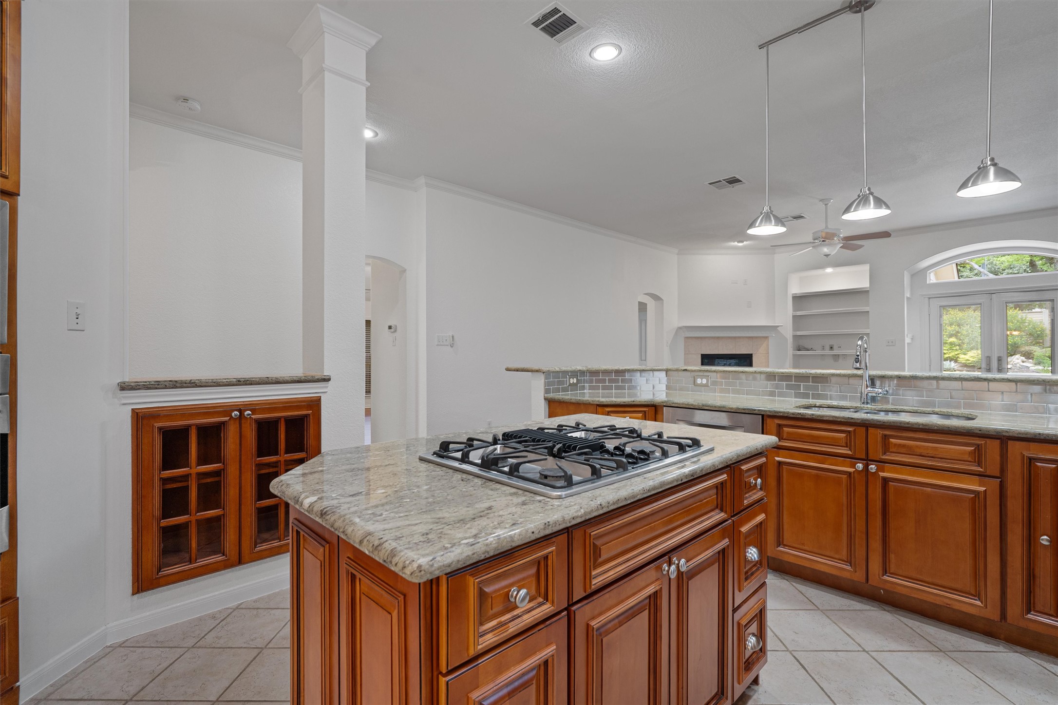 2328 Rodeo Drive Austin, TX 78727 - Photo 11 of 40 a kitchen with a stove a sink dishwasher and a refrigerator