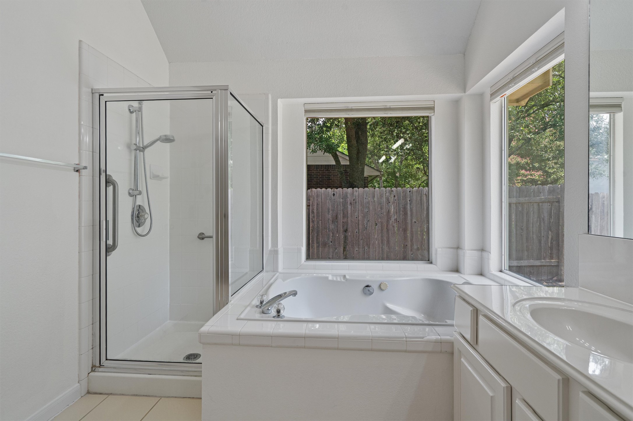 2328 Rodeo Drive Austin, TX 78727 - Photo 24 of 40 a bathroom with a sink and a bathtub