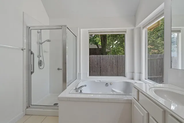 a bathroom with a sink and a bathtub