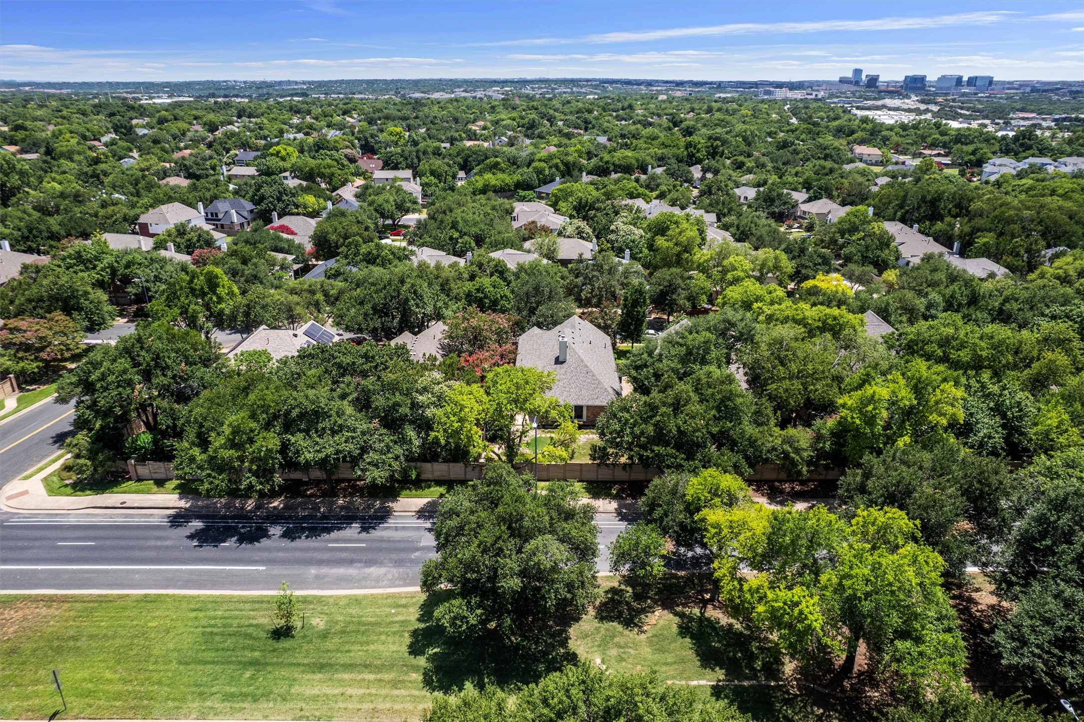 2328 Rodeo Drive Austin, TX 78727 - Photo 38 of 40 a view of a garden with a building in the background