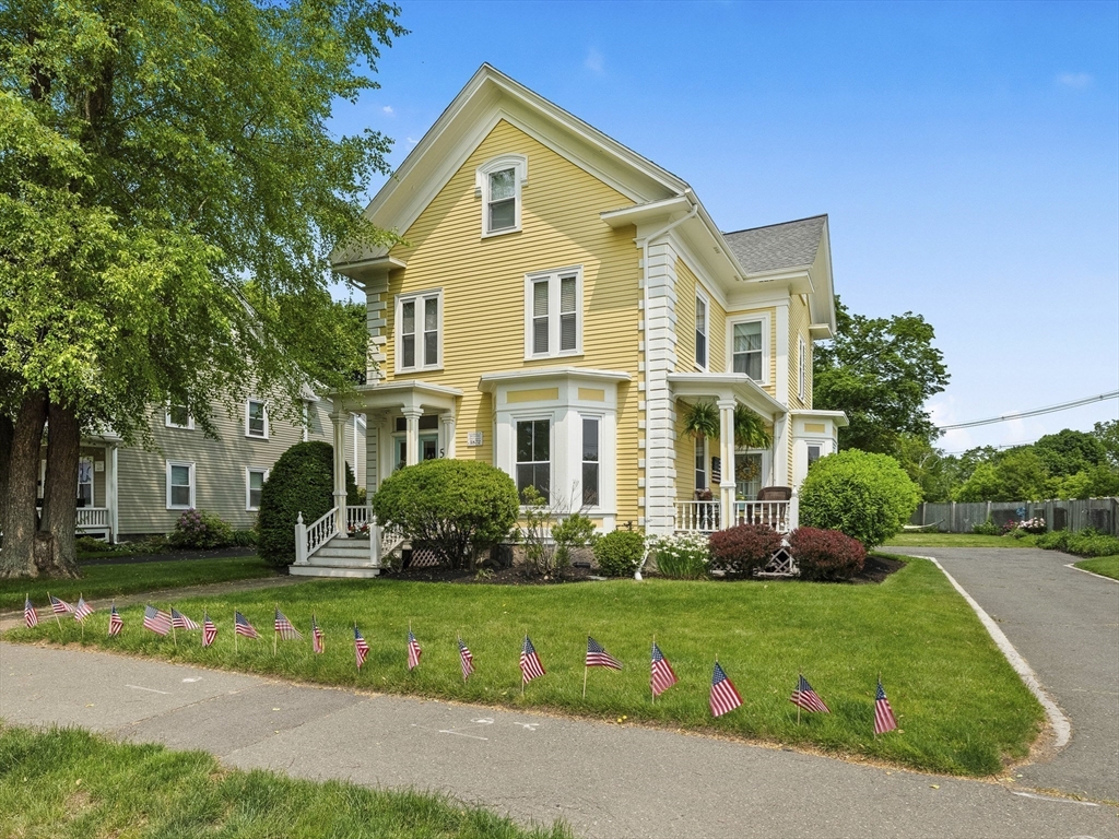 5 Holten Street Danvers, MA 01923 - Photo 1 of 42 a front view of a house with a yard