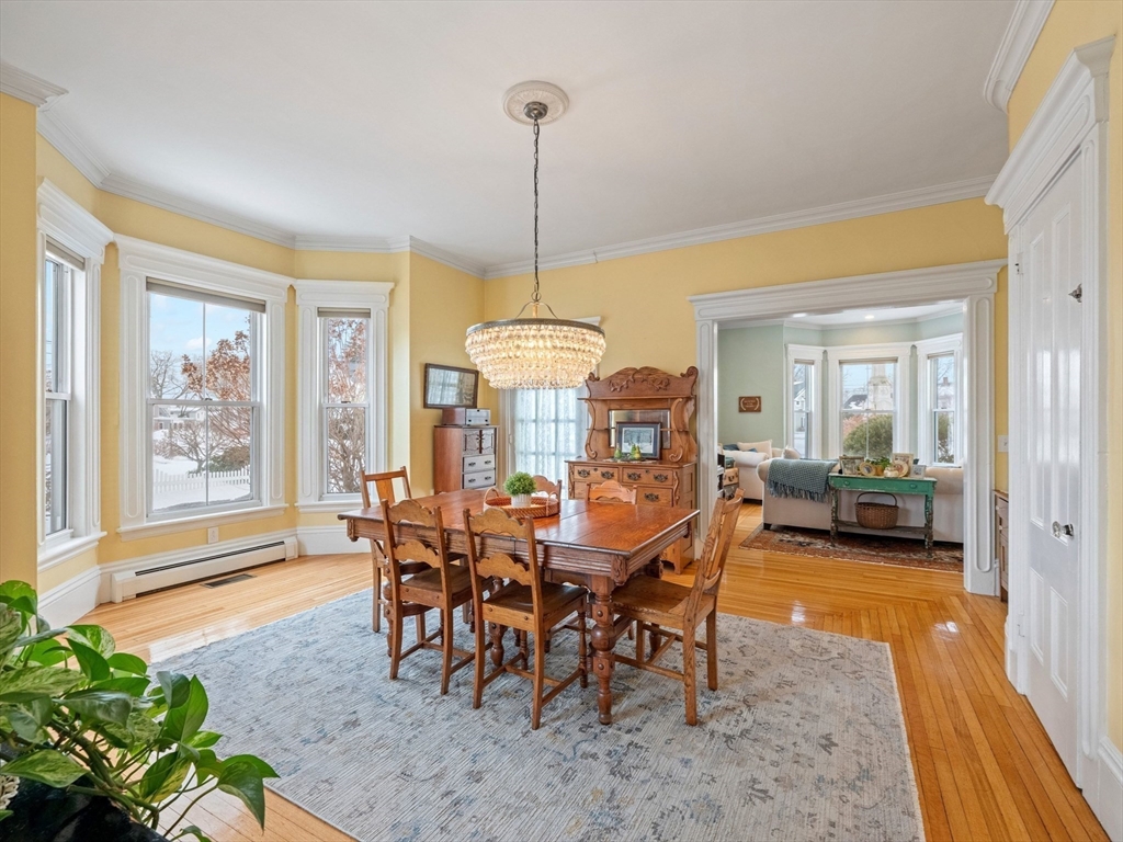5 Holten Street Danvers, MA 01923 - Photo 13 of 42 a view of a dining room with furniture window and wooden floor