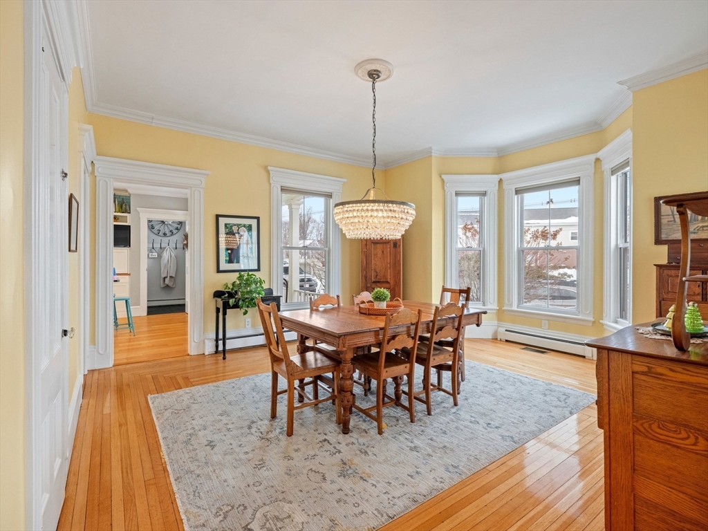 5 Holten Street Danvers, MA 01923 - Photo 14 of 42 a view of a dining room with furniture window and wooden floor